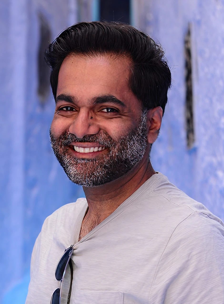 male team member smiling
